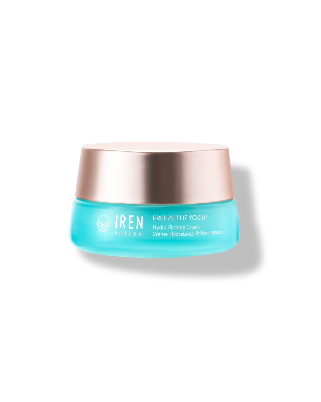 A turquoise jar of FREEZE THE YOUTH Hydra Firming Cream by IREN Shizen with a metallic lid showcases its age-defying snow mushroom extract formula, isolated on a white background.