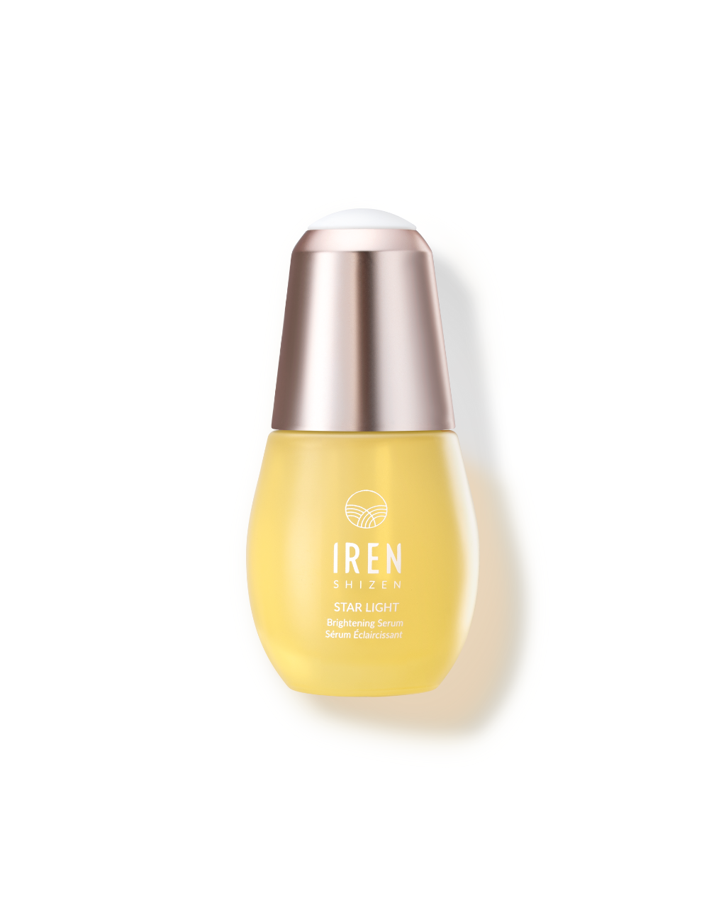 A bottle of IREN Shizen 7-Day Serum Trial with a gold lid on a white background.
