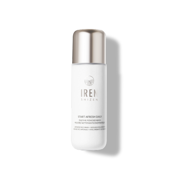 A white bottle of IREN Shizen START AFRESH DAILY Enzyme Powder Wash with a silver cap sits against a light background—this gentle, waterless rice enzyme cleanser and daily exfoliator reveals radiant skin.